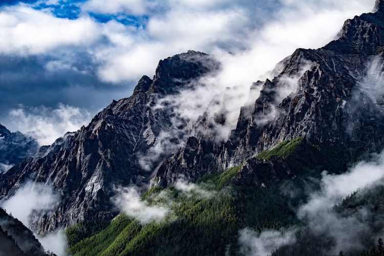 Scenic view of rocky mountains against sky