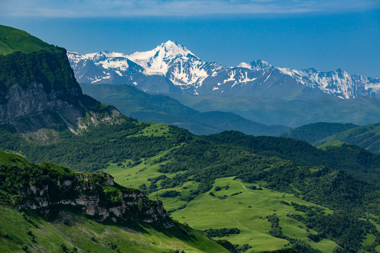Mountains in the caucasus in chechnya. scenic view of snowcapped mountains against sky