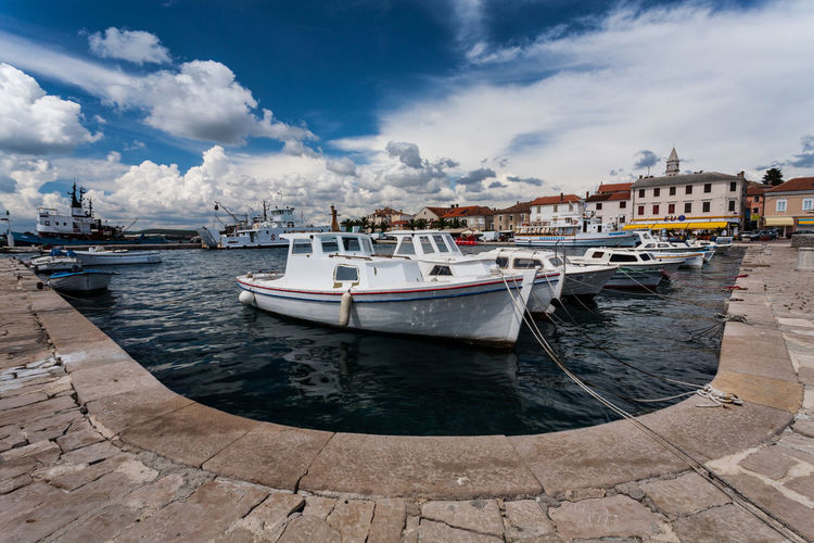 Boats moored at harbor, biograd na moru, croatia