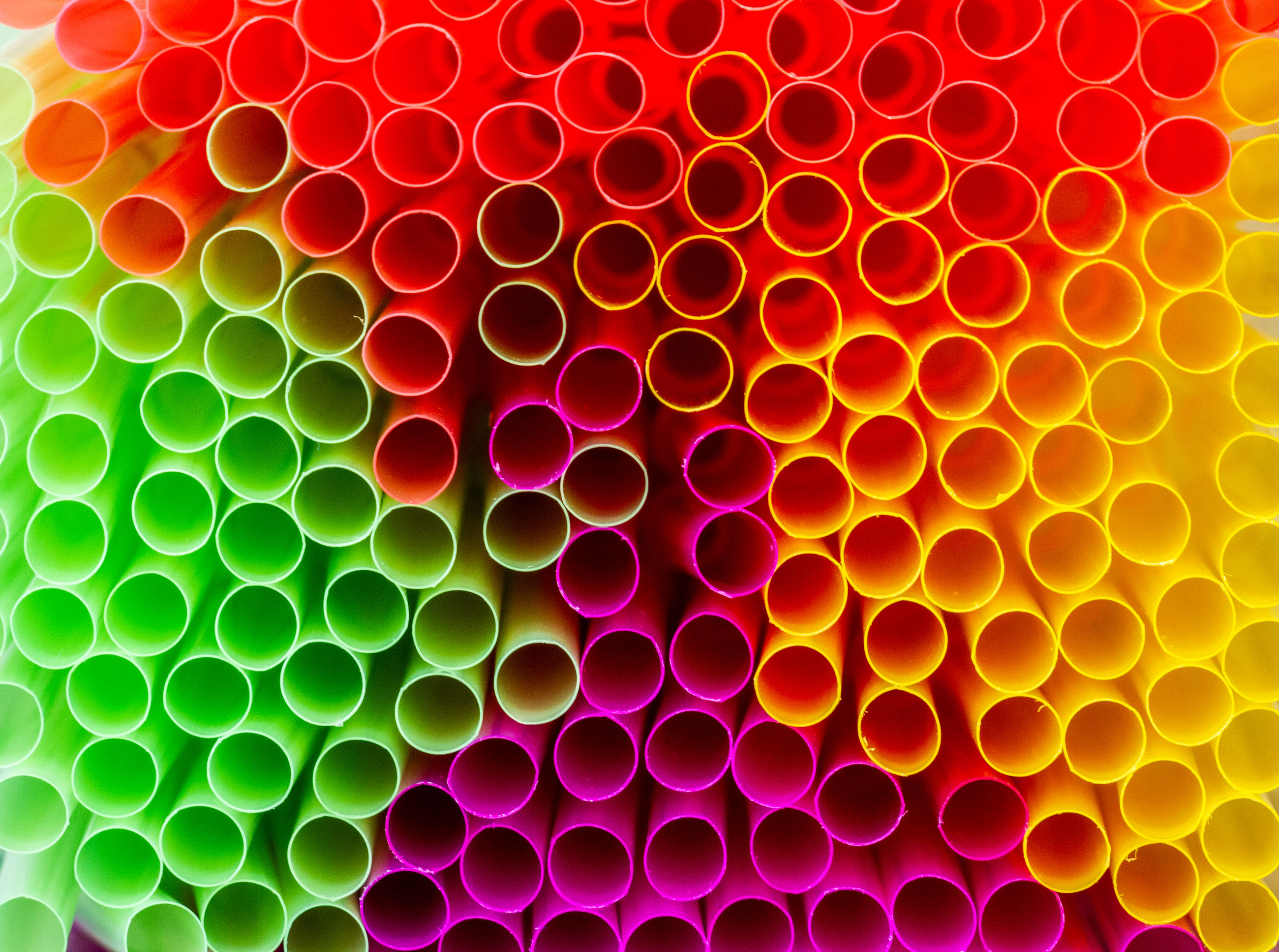full frame, multi colored, backgrounds, pattern, no people, indoors, geometric shape, close-up, shape, design, large group of objects, arrangement, circle, drinking straw, repetition, abundance, still life, straw, plastic, stack