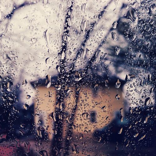 Rain drops on water