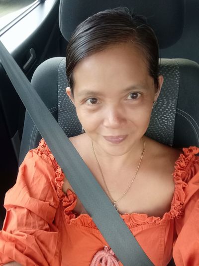 Portrait of woman in car