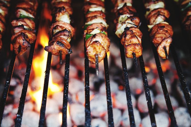 Close-up of meat on barbecue grill