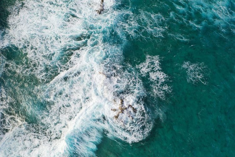 High angle view of waves in sea
