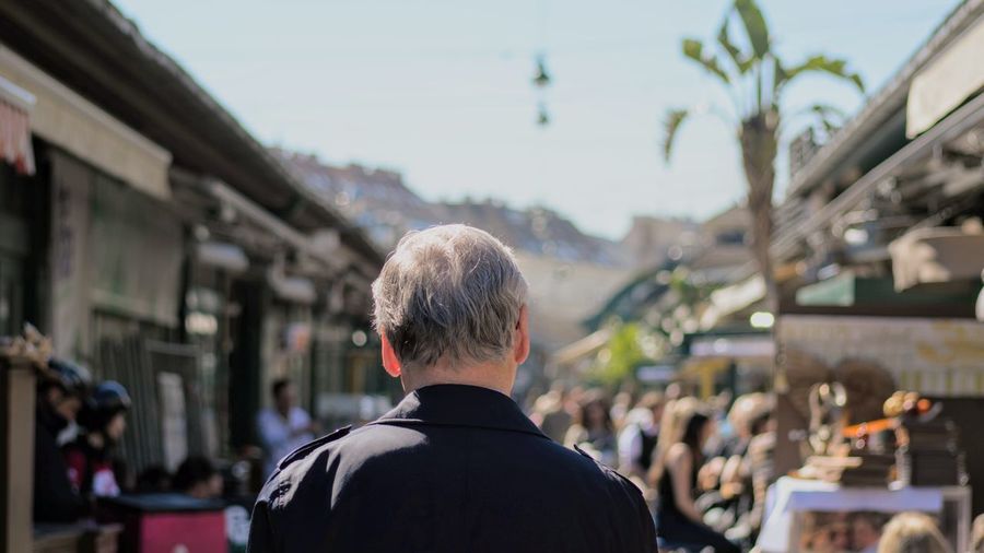 Rear view of a man in city