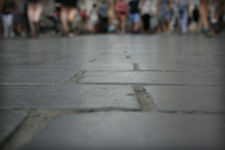 Low section of people on road