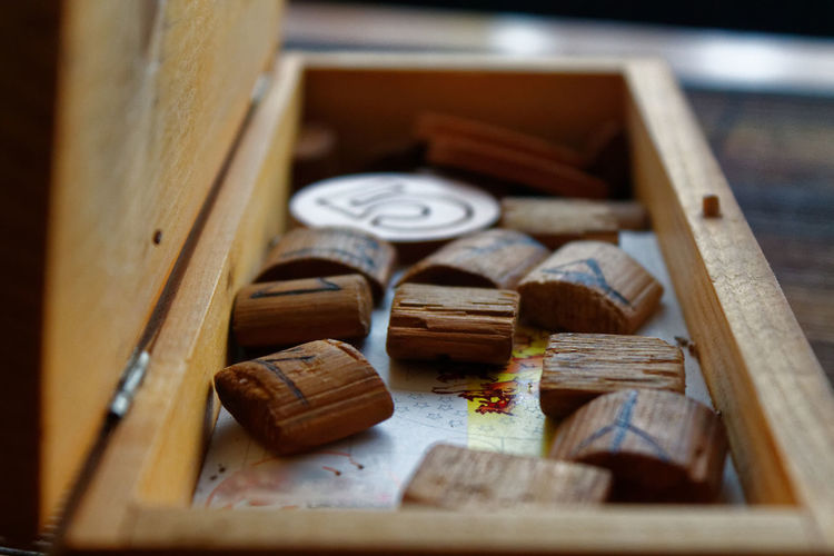 Close-up of corks in wooden box