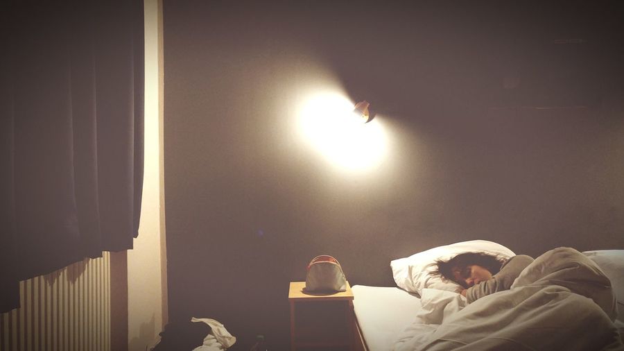 Woman sleeping in bed