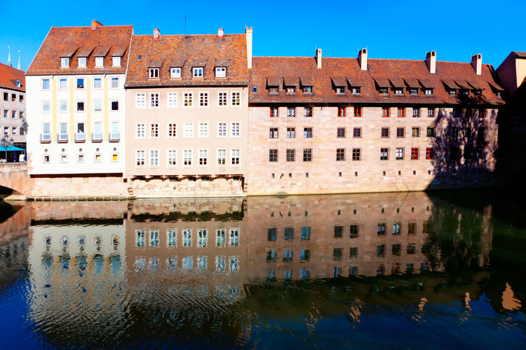 Nuremberg architecture and river . buildings with tiled roof in bavaria germany
