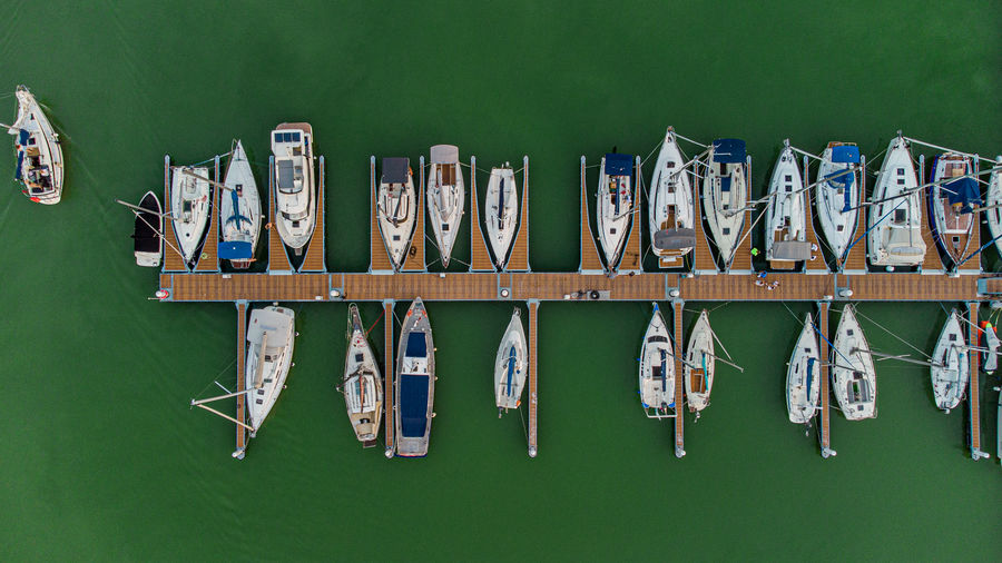 High angle view of boats moored in harbor