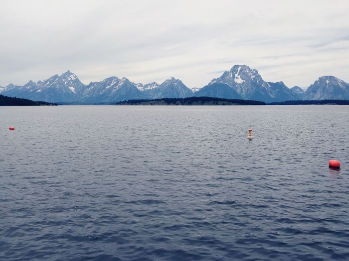 View of jackson lake in grand teton national park with the teton mountains in the background