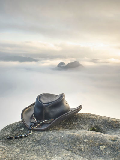 Wild west. traditional american cowboy hat. misty rocky mountains. texas rodeo style