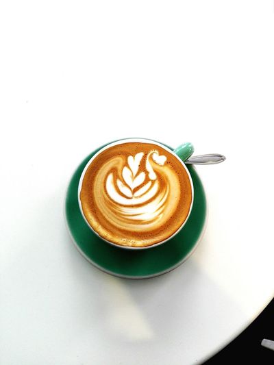 High angle view of cappuccino on table