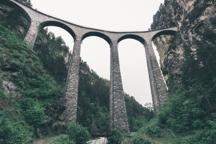 Low angle view of landwasser viaduct against clear sky