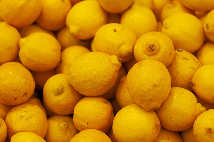 Full frame shot of lemons for sale at market