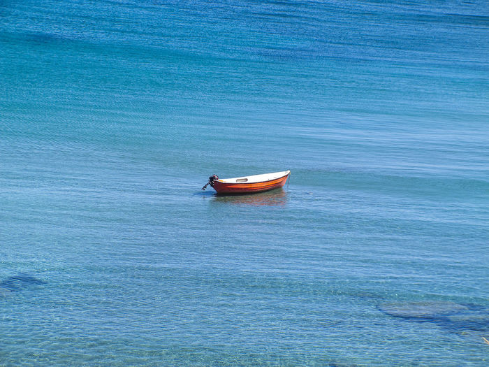 Boat moored on sea
