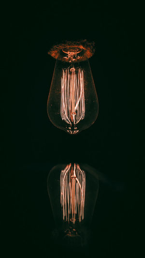 Illuminated light bulbs in the dark