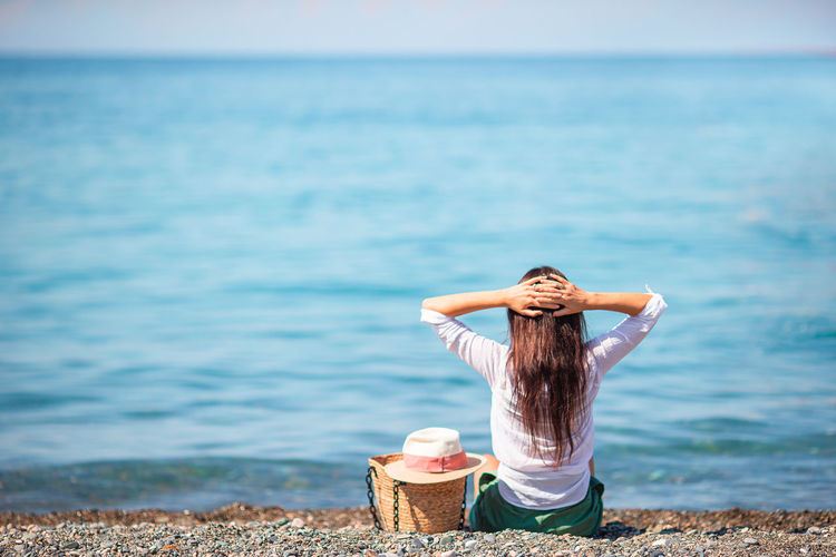 Rear view of woman in sea
