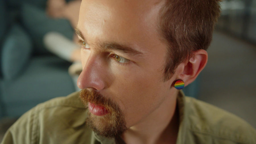 Close-up of gay man wearing earring