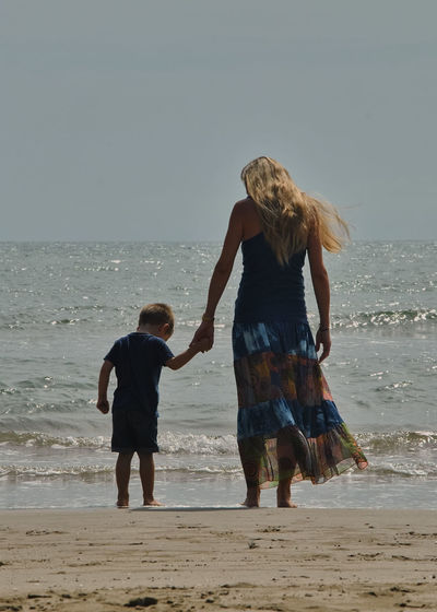 Mother and son love on the beach. love of mother