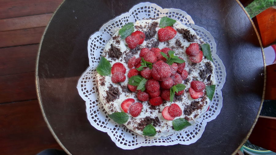 Directly above view of fresh fruitcake on table