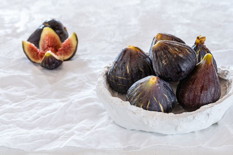 Close-up of figs on table