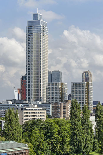 Skyscrapers in city against sky