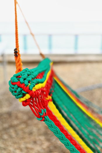 Close-up of multi colored hammock outdoors
