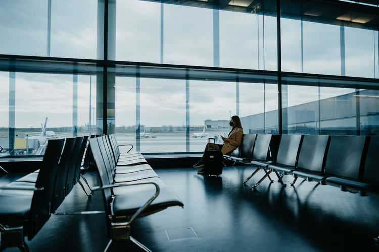 Woman waiting at airport
