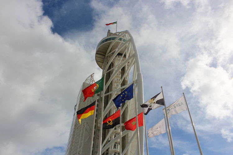 Low angle view of flag against sky