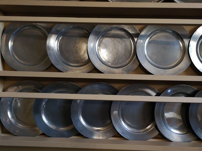 Plates arranged in shelf