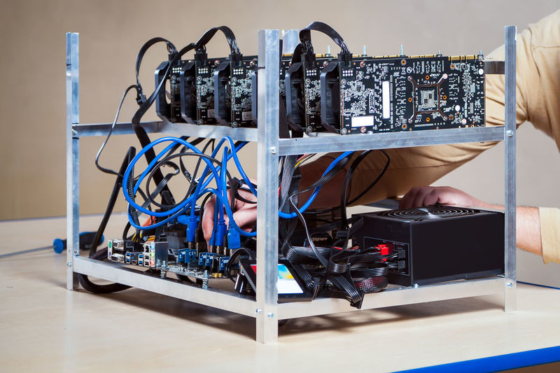 Farm for mining crypto currency on video cards close-up. device for mining crypto currency.