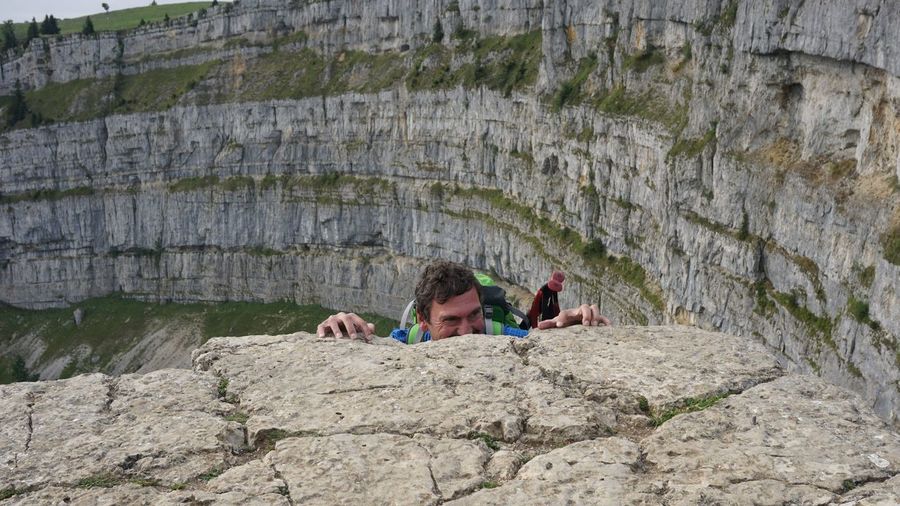 Man climbing on rock formation