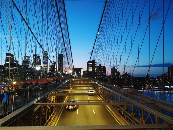View of suspension bridge in city