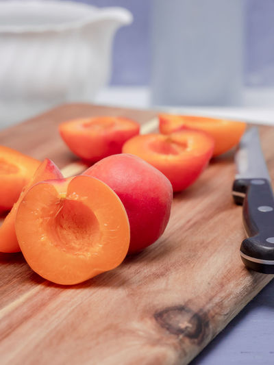 Close-up of chopped fruits on cutting board