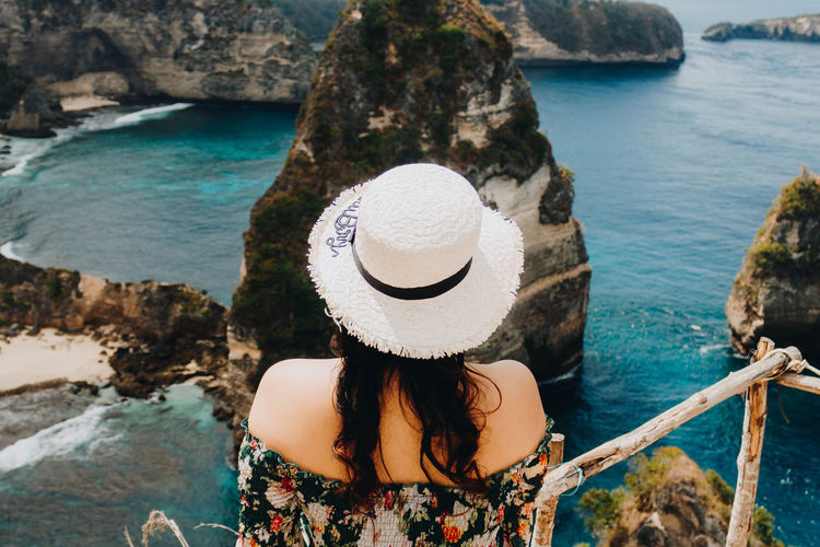 Rear view of woman looking at sea