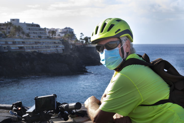 Portrait of man with cycling helmet