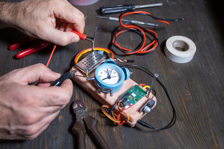 Bomb maker constructing home made explosive
