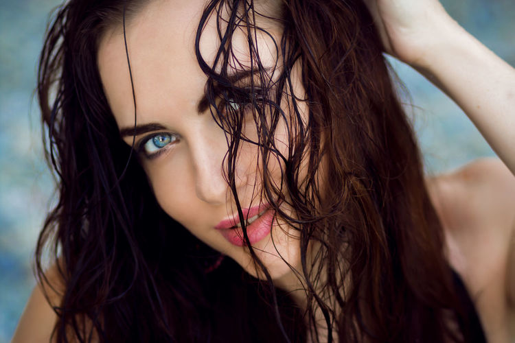 Portrait of young woman with wet hair