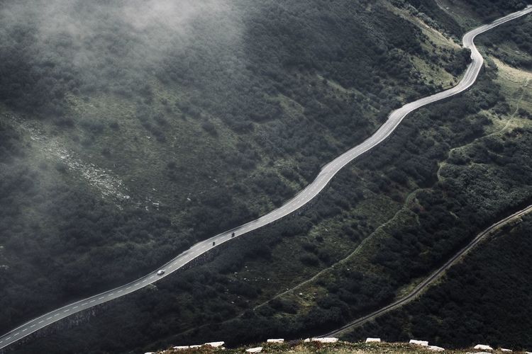 High angle view of winding road on land