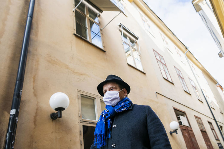 Man wearing protective mask on street
