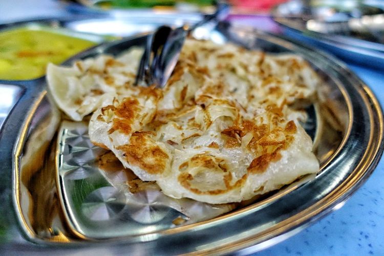 Close-up of naan bread in plate