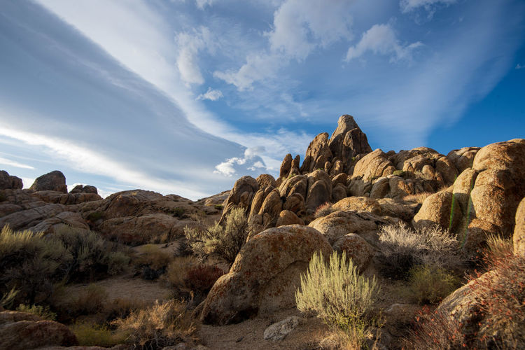 Lenticular cloud formation over rocky desert