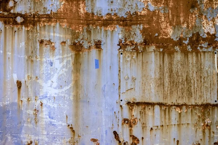 Full frame shot of rusty metal on wall