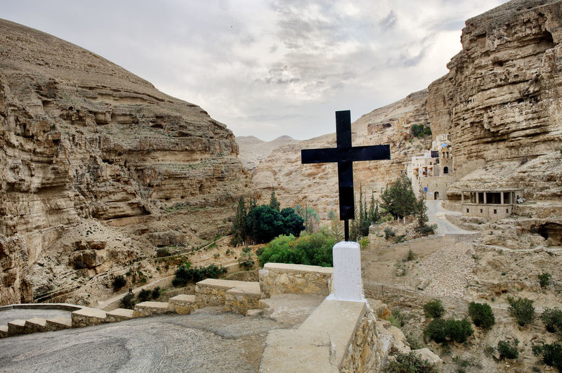 St george monastery at wadi qelt against sky