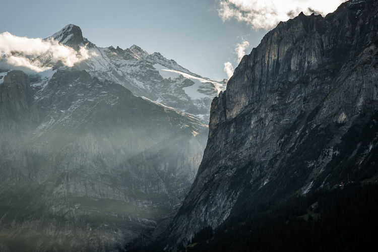 Scenic view of alps near grindelwald against sky