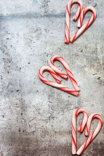 High angle view of candy canes on table