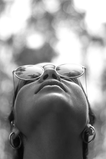Low angle view of woman wearing eyeglasses