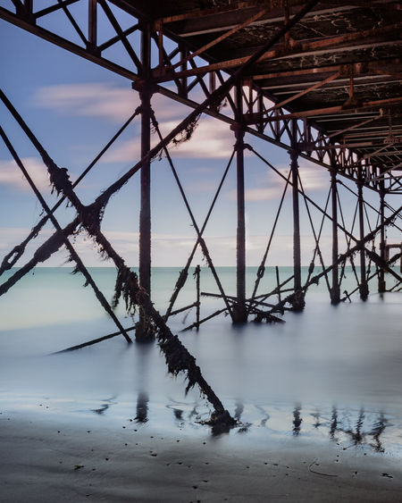 Long exposure of the sea under southsea pier in portsmouth . . .