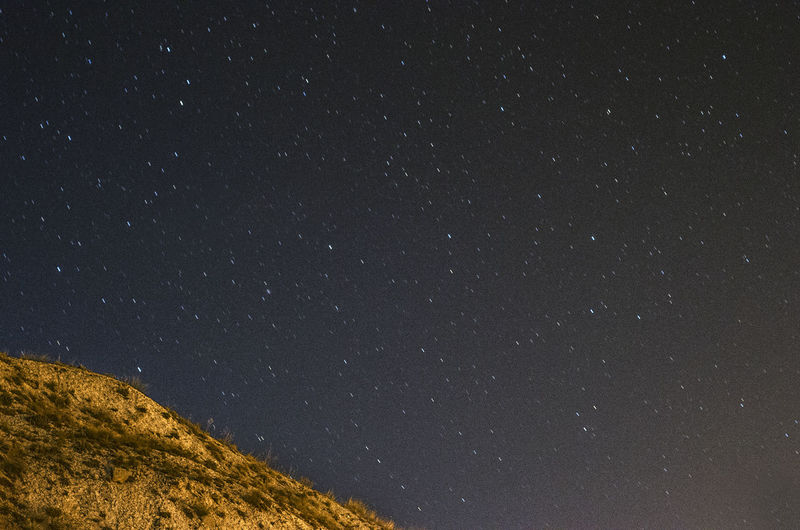 Low angle view of stars against sky at night